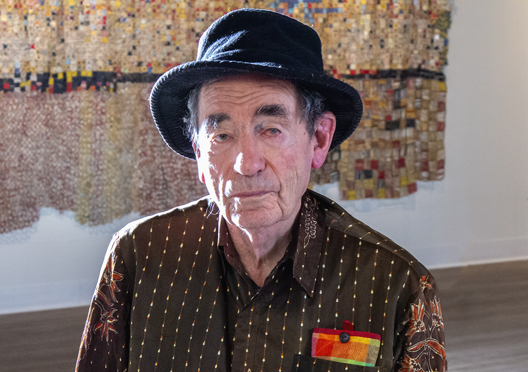 Justice Albie Sachs poses for an image at the Mott Warsh Gallery in Flint, Michigan.
