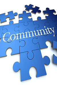 A puzzle has the word community on a blue background.