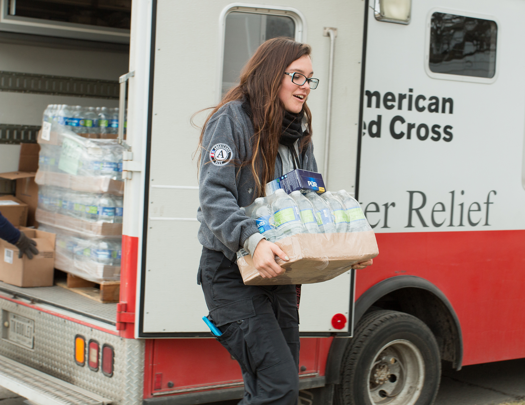 AmeriCorps Memebers and Red Cross volunteers working to help Flint citizens during the water crisis.
