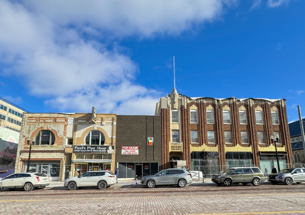 The 641 Saginaw St. building (on the left) and the Paterson Building (on the right).