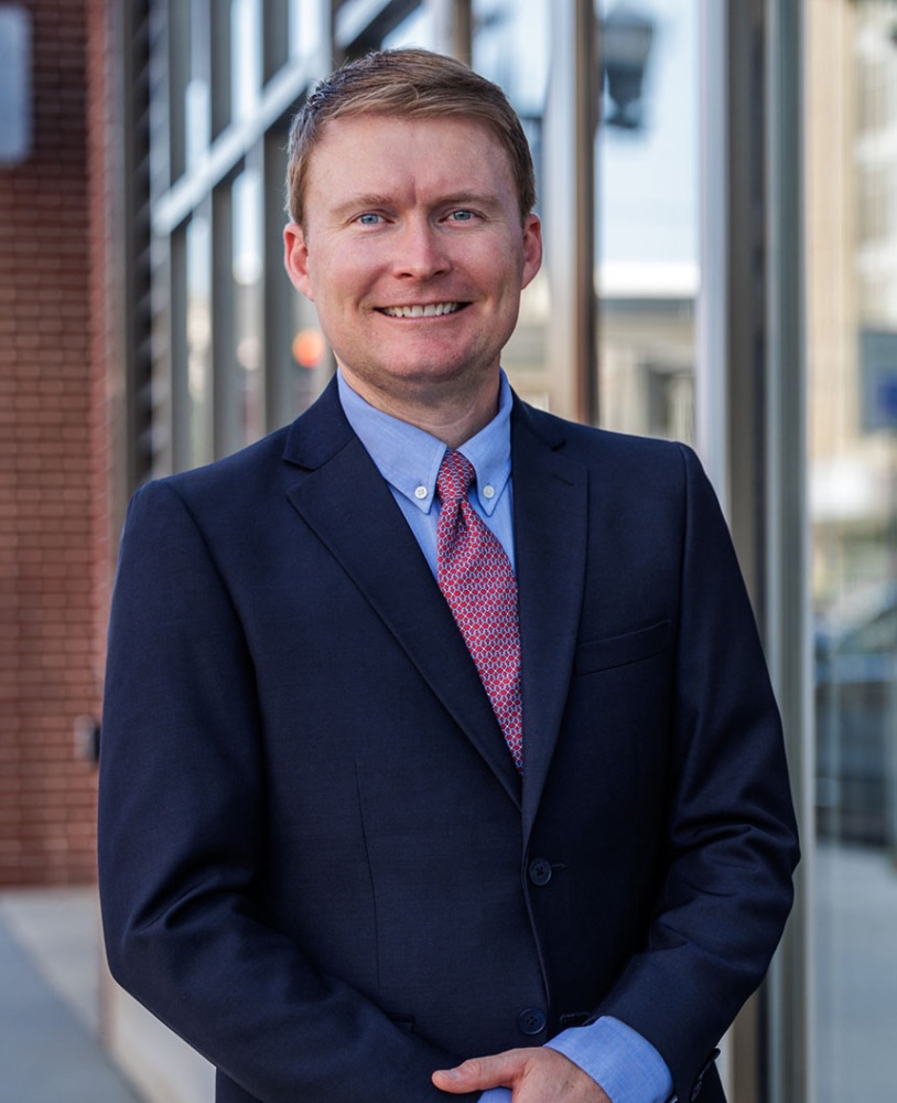 A headshot of Kevin Perkins.