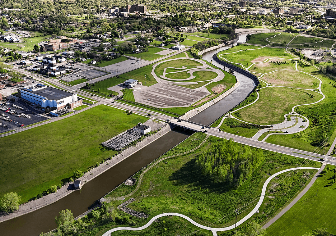 Aerial view of Chevy Commons shows the transformation of former industrial land into a vibrant public space along the Flint River.
